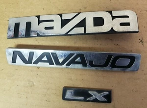91 92 93 94 MAZDA NAVAJO REAR GATE TRUNK LID EMBLEMS LOGOS BADGE SIGNS - Picture 1 of 2