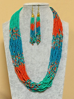 Juego de pendientes collar de cuentas de semillas de vidrio azul naranja y turquesa de varios hilos Foto 1 de 3