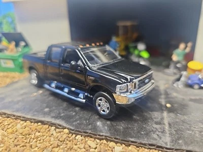 ИНДИВИДУАЛЬНЫЙ Lariat 2004 Ford 6.7 F250 4x4 1/64 Greenlight сцепное устройство и буксировка Ertl фермерский грузовик - Изображение 1 из 4