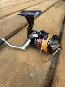 Shimano Sephia BB 3810H Spinning Reel with Orange and Green Gradient Line - Picture 1 of 4