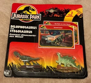 1993 Kenner Jurassic Park Dilophosaurus/Stegosaurus Die-Cast Metal German - New - Picture 1 of 3