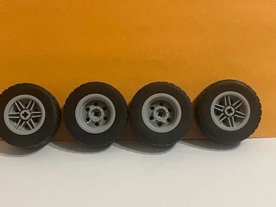 Lego Technic Lot 4 Large 49.5 x 20 S GREY  Wheel with BLACK Rubber Tyre - Image 1 of 3