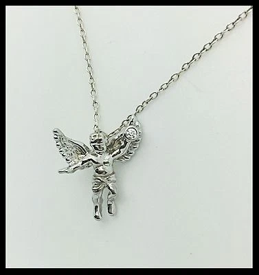 Pequeño colgante de ángel Cupido de oro de 18k con diamante Foto 1 de 3