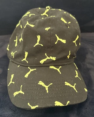 Gorra de béisbol Puma negra ajustable con logotipos amarillos Foto 1 de 4