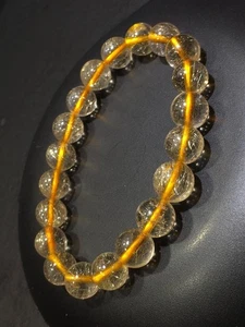 9mm Natural Gold Rutilated Titanium Quartz Crystal Bracelet AAA - Picture 1 of 9