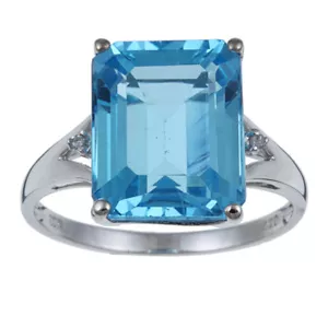 Anello in oro bianco 10 kt con topazio blu taglio smeraldo e diamanti - Foto 1 di 4
