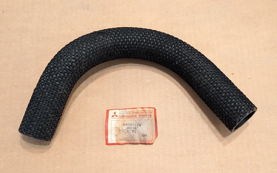 Manguera de radiador inferior Mopar/Mitsubishi NOS 1974 Dodge Colt con motor "U" 2000cc Foto 1 de 1