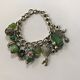 Charm Bracelet Silver Tone With Assorted Green Chatms