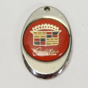 Cadillac Rear Trunk Lock Cover Logo Emblem Crest Badge  1 7/8" x 1 1/4" x 1/8" - Picture 1 of 4