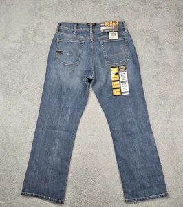Pantalones de mezclilla de trabajo Ariat para hombre con barras de refuerzo M4 32x30 corte bota DuraStretch calce relajado nuevos con etiquetas - Imagen 1 de 14