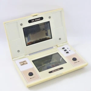 JUNK LCD OIL PANIC Reloj de Juegos Consola Portátil SIN Cubierta de Batería 1119 - Imagen 1 de 11