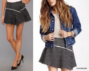 Minifalda FREE PEOPLE Bento negra blanca texturizada algodón acampanada talla 4/6 (?) - Imagen 1 de 11