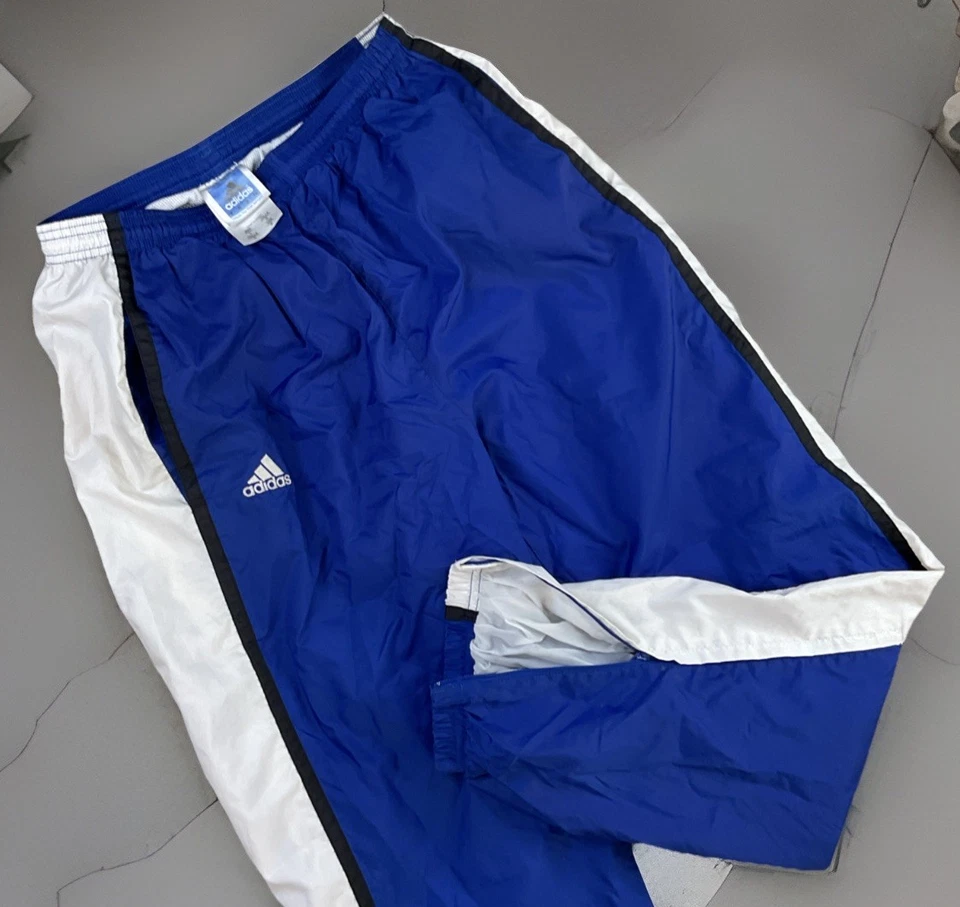 Pantalones deportivos Adidas Winbreakers vintage forrados de malla azul blanco años 90 para hombre talla L logotipo Foto 1 de 4