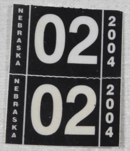 2004 Nebraska passenger car license plate sticker pair - Picture 1 of 1