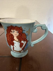 Taza Original Auténtica Azul Disney Store Con Mérida de Brave Disneyland - Imagen 1 de 5