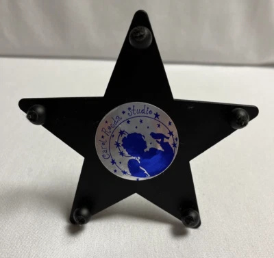 Candelabro Base Estrella Negra Carol Roeda Studio Foto 1 de 4