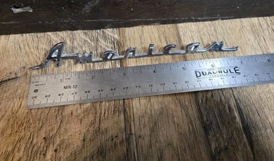 AMC RAMBLER EMBLEMA AMERICANO ESCRITURA OEM  Foto 1 de 2