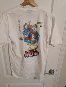 T-shirt Huf Capcom Street Fighter II Chun-Li e Cammy taglia Medium - Foto 1 di 4