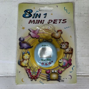 Tamagotchi Like - Mini-Mascotas 8 en 1 - Por Picture Art 1997 - Juguete de colección - Imagen 1 de 4