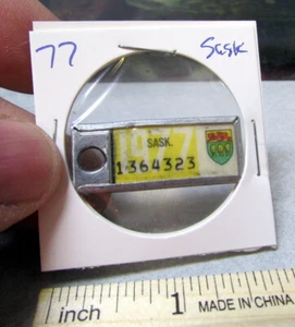 1977 Saskatchewan Canadá 1364323 Mini placa etiqueta llavero amplificadores de guerra - Imagen 1 de 2