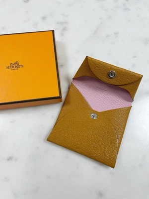 Monedero cambio Hermes Bastia verso Color: caramelo/malva silvestre Foto 1 de 4