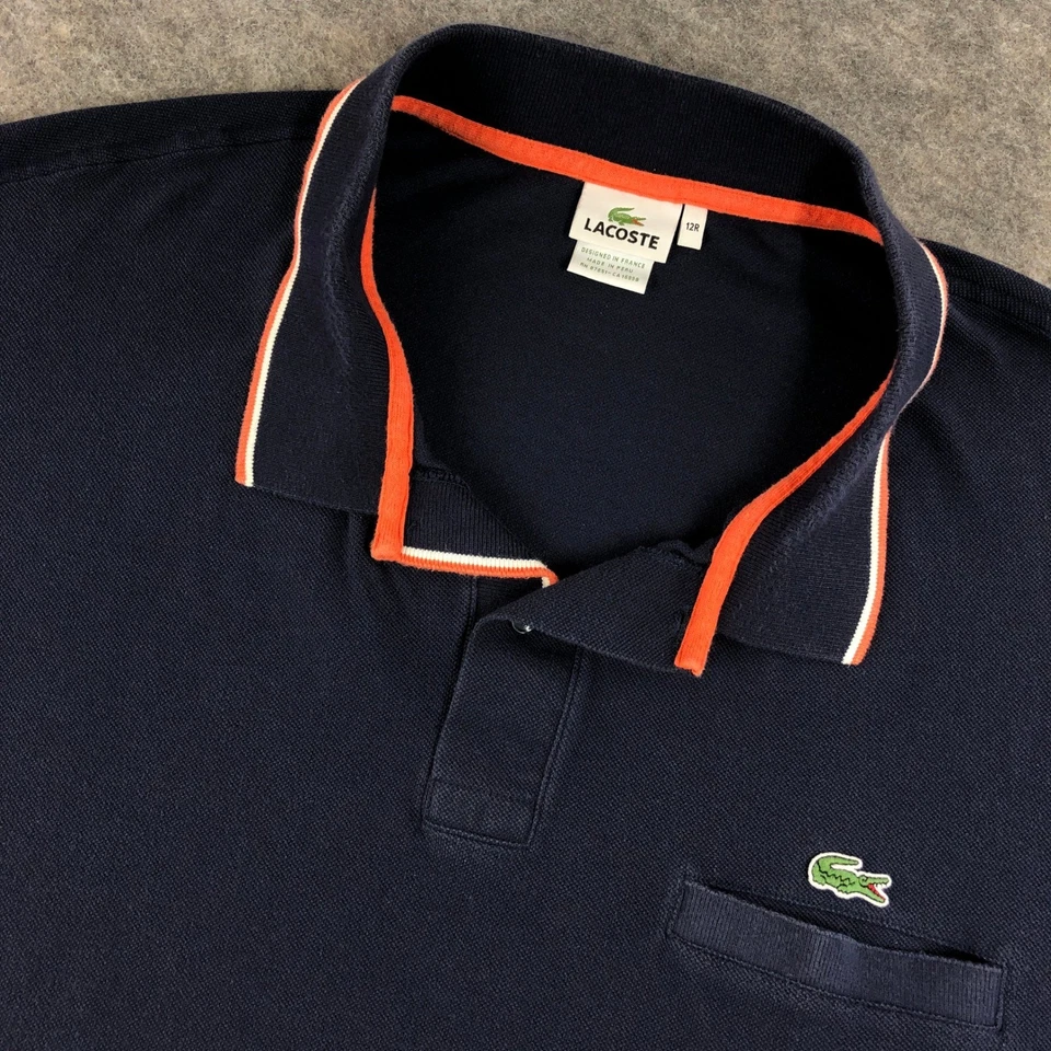 Lacoste Men's Navy Blue Polo Shirt Size 12R Orange Trim Pocket - Image 1 of 4
