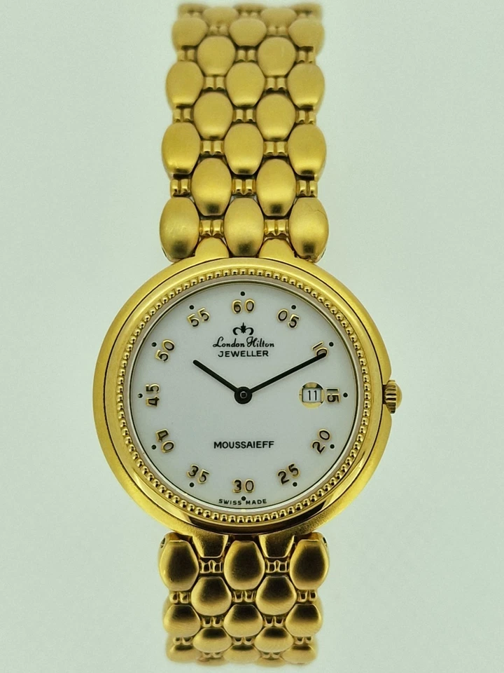 Reloj Moussaieff Lujo Zafiro Oro Hecho en Suiza Cuarzo London Hilton Joyero Foto 1 de 4