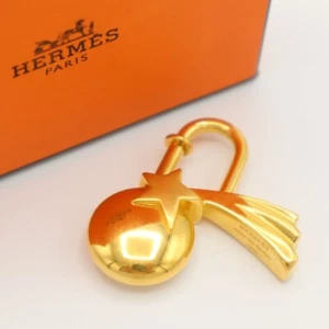 Lucchetto Hermes Shooting Star Cadena tono oro 1999 edizione limitata con scatola da JP - Foto 1 di 8