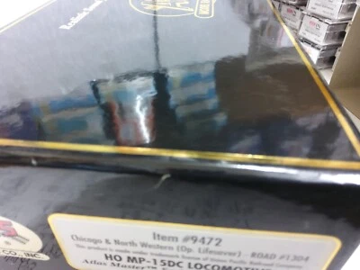 ATLAS HO MP15DC CHICAGO NORTH WESTERN NUMBER 1304 QUANTUM SOUND - Image 1 of 4