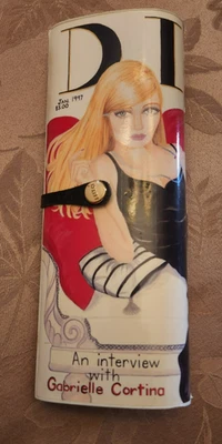 Cartera sin asas negra para mujer LUCTI 1997 Diva Magazine de Anna Silvey Foto 1 de 4