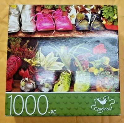 Rompecabezas Cardinal 1000 Piezas "Zapatos con Plantas" 22" x 14" Nuevo Foto 1 de 2