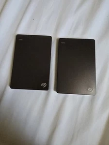 Two Seagate Backup Plus SRD00F1 Portable External Hard Disk Drive 1TB, Black - Photo 1/1