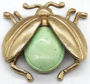 Pisapapeles Ladybug color dorado con incrustación verde en el cuerpo Pisapapeles - Imagen 1 de 4