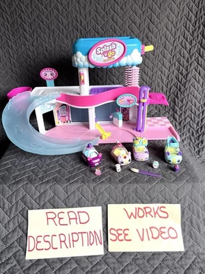 Shopkins Cutie Cars Splash n Go Spa Juego de lavado de autos 4 autos con 4 conductores + cepillo Foto 1 de 4