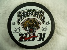 WCHL Tacoma Sabercats '00-01 Team Logo League Reverse Hockey Puck Collect Pucks