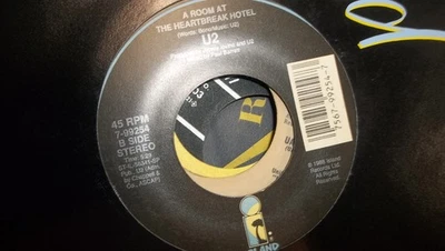u2 45 record angel of harlem/a room at heartbreak hotel/very good - Image 1 of 2