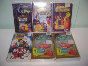 LOT OF 6 NEW AND SEALED DISNEY VHS MOVIES SLEEPING BEAUTY LADY AND THE TRAMP ETC - Picture 1 of 1