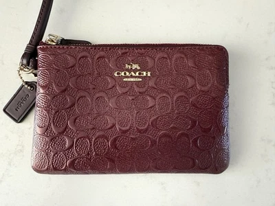 Coach Signature Burgundy Debossed Patent Leather Wristlet Wallet - Image 1 of 4