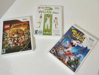 Wii Games Family 3 Pack! Wii Fit Plus Indiana Jones Rabbids Go Home Gift Pack! - Image 1 of 2