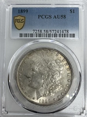 1899 $1 Morgan Silver Dollar Coin PCGS AU58 **Better Date** Gold Shield - Toning - Image 1 of 4