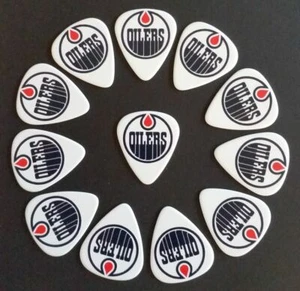 Selecciones de guitarra con el logotipo de NHL Oilers (12 púas) - (Compra 2, ahorra 50% en la segunda) - Imagen 1 de 1