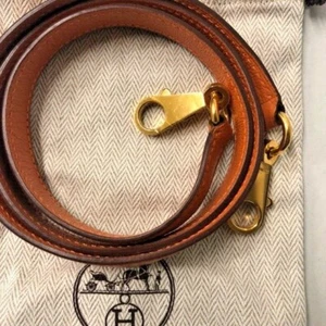 Tracolla HERMES Paris per scatola ferramenta Kelly oro vitello Taurillon Clemence - Foto 1 di 33