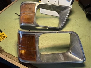 OEM 1985 - 1989 Aries Reliant Right & Left Headlight Bezel & Turn Signal - Picture 1 of 6