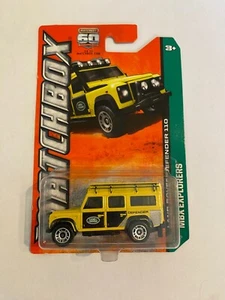2012 MATCHBOX MBX EXPLORERS LAND ROVER DEFENDER 110 YELLOW 59 OF 120 - Picture 1 of 3