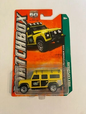 2012 MATCHBOX MBX EXPLORERS LAND ROVER DEFENDER 110 YELLOW 59 OF 120 - Image 1 of 3