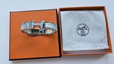 Pulsera Hermes Clic H Estampada Bijoux Trompe L'Oeil En Placio/Blanco Talla PM Foto 1 de 4