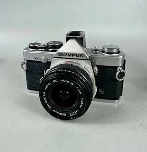 Cámara fotográfica Olympus OM-2n 35 mm SLR de colección con lente 28 mm F/2,8 - probada - Imagen 1 de 12