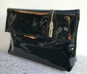 Las mejores ofertas en Cuero sintético Yves Saint Laurent Bolsos y estuches  de maquillaje | eBay