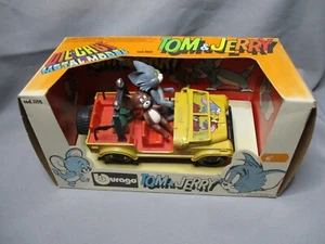 AK791 BURAGO 1/24 JEEP TOM ET JERRY BD REF 1105 BON ETAT - Foto 1 di 8