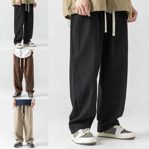 Pantalones drapeados de color liso para hombre ideales para actividades al aire libre y eventos - Imagen 1 de 27